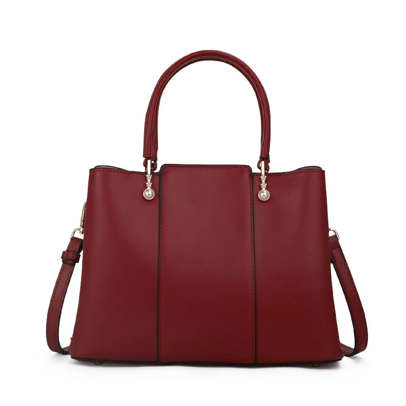 High-capacity cowhide women's fashionable contrasting color handbag