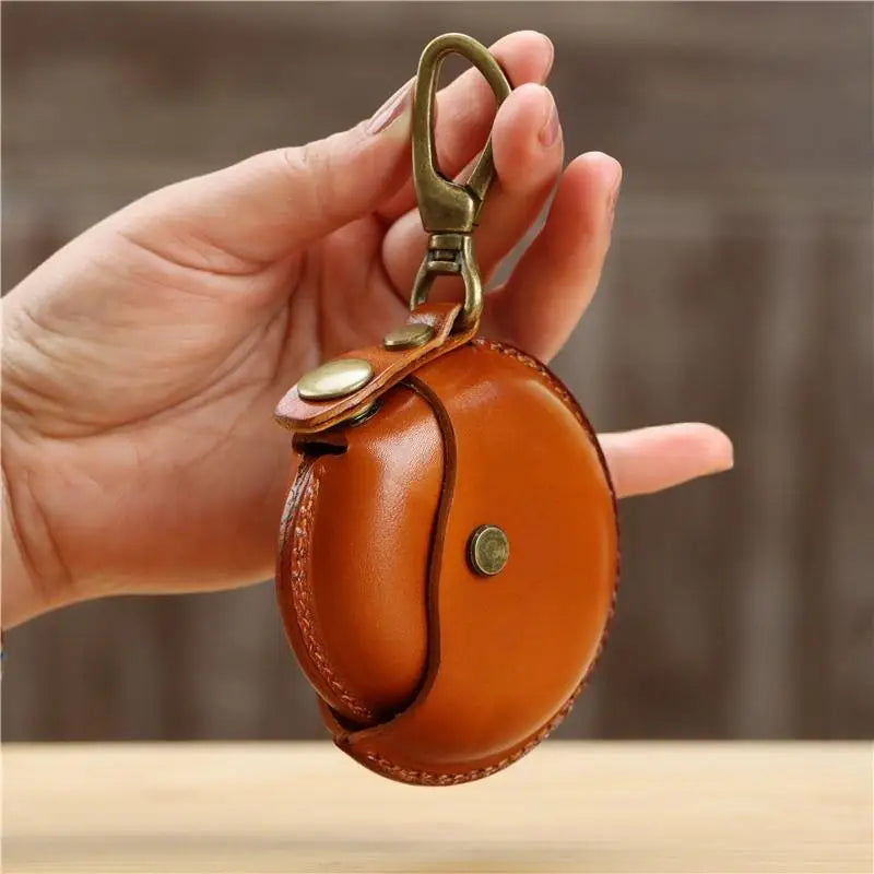 Handcrafted genuine leather small round Bluetooth earphone bag