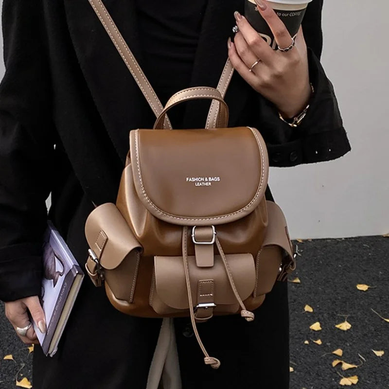Vintage Black & Brown Leather Backpack Drawstring Flap Design with Side Pockets