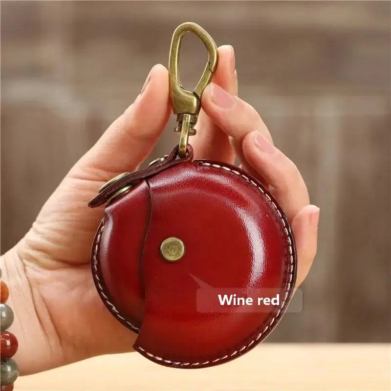 Handcrafted genuine leather small round Bluetooth earphone bag